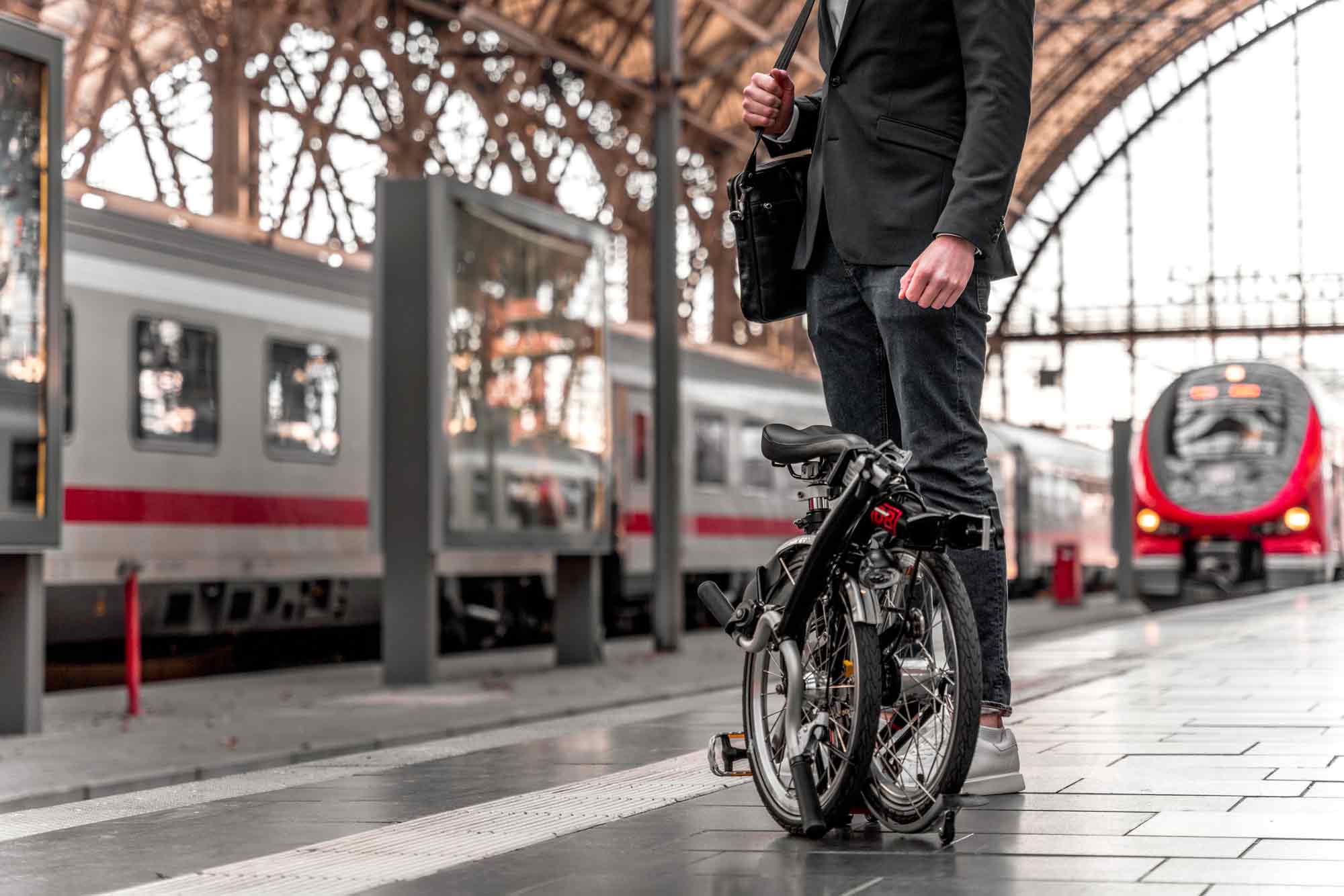 A brompton convinces with minimal "packing dimensions" and low weight. You won't take another bike on the train that easily!